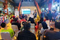 Pemimpin Cabang BRI KC Tanjung Duren Tri Ichsan Nur sedang menyampaikan Sosialisasi kepada padagang Pasar Tomang Barat atau Pasar Kopro